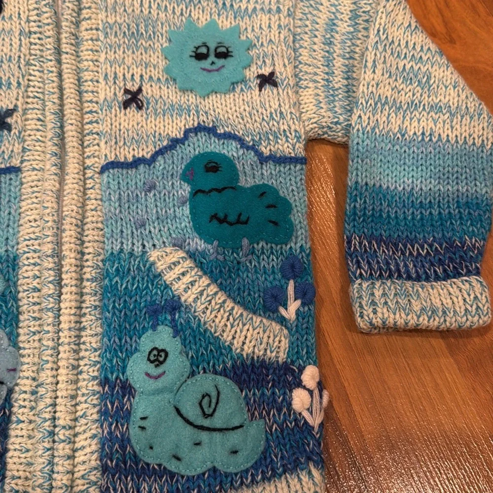 Handmade in Peru girls size 2 blue knit sweaterter with sewn on designs‎ knit